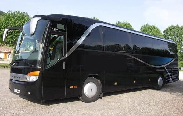 Sleek 44-seater luxury coach available for hire in Toulouse, featuring a black exterior